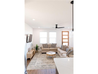 Completed in 2024, this beautifully crafted home offers the - photo 9