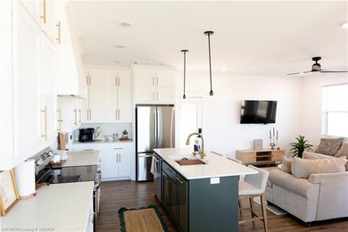 Completed in 2024, this beautifully crafted home offers the - photo 10