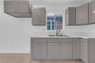 This well-maintained duplex offers two units under one roof - photo 9