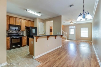 Charming 2-Story Townhouse WITH A NEW ROOF! This lovely - photo 2