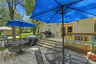 Tucked away along the shoreline of Lake Hamilton in a peaceful - photo 7