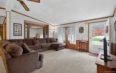 Tucked away in Calverton Meadows, a private setting within a - photo 3