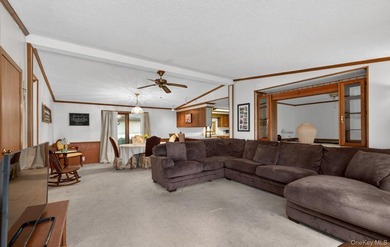 Tucked away in Calverton Meadows, a private setting within a - photo 4