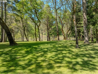 Set along a rare, low-bank stretch of the Rogue River within a - photo 44