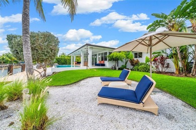 Miami Shores luxury waterfront home with 100-ft of protected - photo 16
