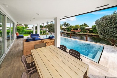 Miami Shores luxury waterfront home with 100-ft of protected - photo 18