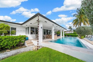 Miami Shores luxury waterfront home with 100-ft of protected - photo 21