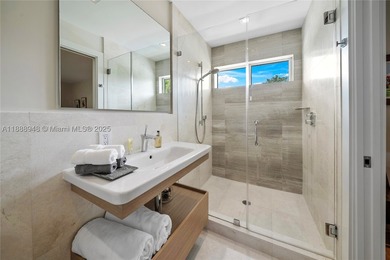 Miami Shores luxury waterfront home with 100-ft of protected - photo 53