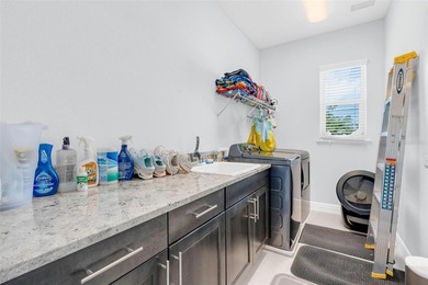 Welcome to this beautifully appointed home in the highly - photo 24
