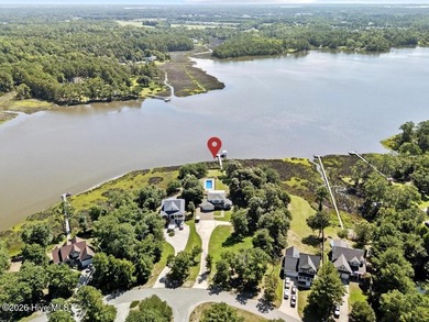 This meticulously maintained waterfront home offers the ideal - photo 3