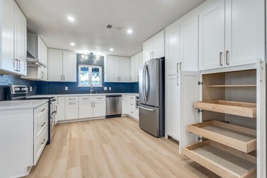 NEW PRICE! Recently completely remodeled home has landed on the - photo 8