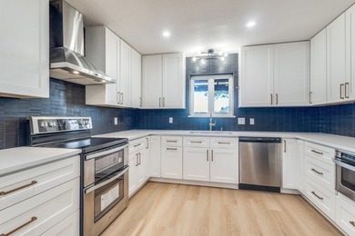 NEW PRICE! Recently completely remodeled home has landed on the - photo 9