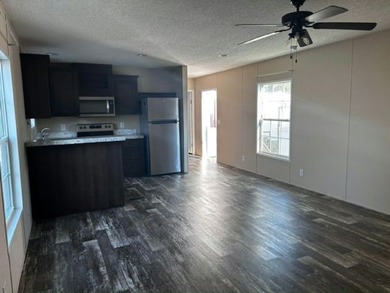 Own your own home in a quiet, well-maintained neighborhood! This - photo 1