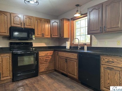 Country living on 2 1/2 acres awaits you with this updated 4