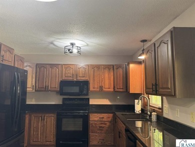 Country living on 2 1/2 acres awaits you with this updated 4