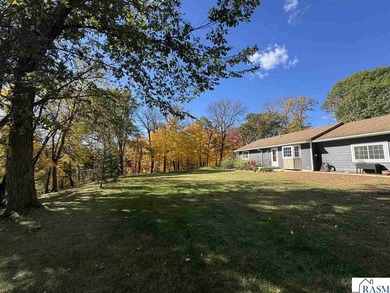 Country living on 2 1/2 acres awaits you with this updated 4