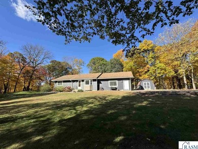 Country living on 2 1/2 acres awaits you with this updated 4