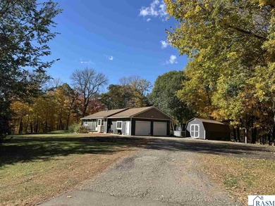 Country living on 2 1/2 acres awaits you with this updated 4