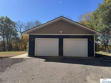 Country living on 2 1/2 acres awaits you with this updated 4