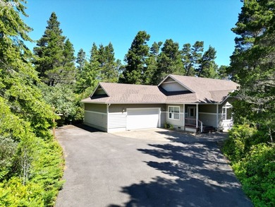 Nestled in a peaceful wooded setting within the desirable Heceta - photo 1