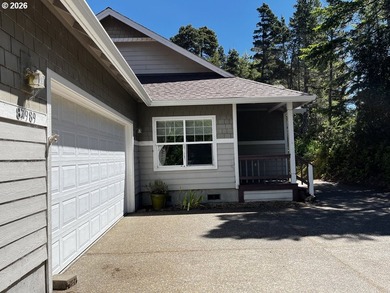 Nestled in a peaceful wooded setting within the desirable Heceta - photo 4