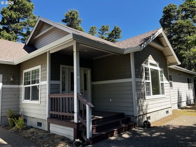 Nestled in a peaceful wooded setting within the desirable Heceta - photo 5