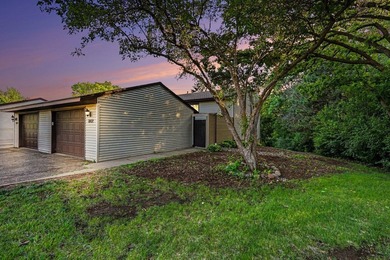 Welcome to this beautifully maintained end-unit townhome in a - photo 1