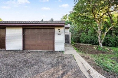 Welcome to this beautifully maintained end-unit townhome in a - photo 2