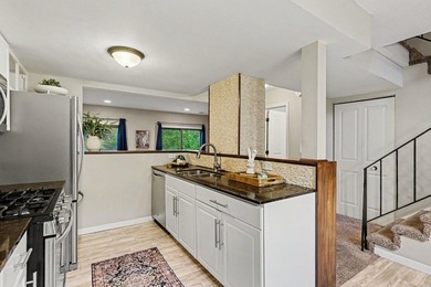 Welcome to this beautifully maintained end-unit townhome in a - photo 3
