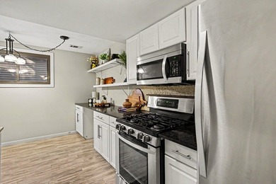 Welcome to this beautifully maintained end-unit townhome in a - photo 4