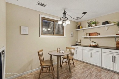 Welcome to this beautifully maintained end-unit townhome in a - photo 6