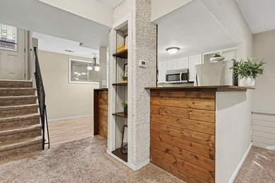 Welcome to this beautifully maintained end-unit townhome in a - photo 7