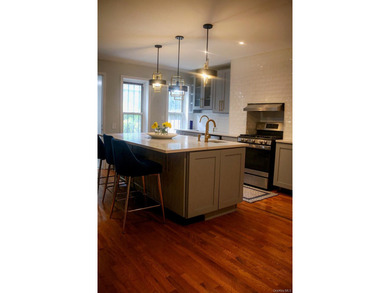 Welcome to this charming attached single-family, three-story - photo 5