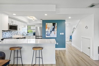 New roof 2026! Beautifully updated 1-bedroom, 1.5-bath townhouse - photo 11