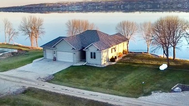 This beautiful Big Stone Lake home offers 120 feet of pristine - photo 2