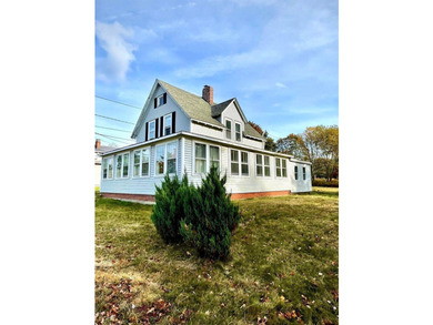 Step into this cozy 2-bedroom, 1.5-bath New Englander, where - photo 1