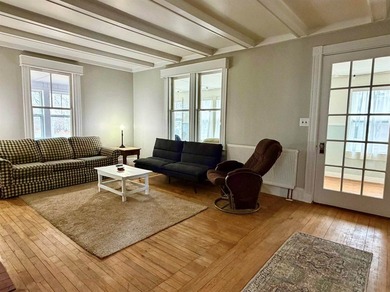 Step into this cozy 2-bedroom, 1.5-bath New Englander, where - photo 4