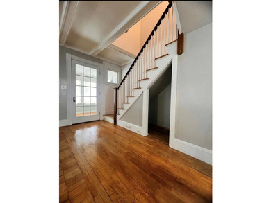 Step into this cozy 2-bedroom, 1.5-bath New Englander, where - photo 5