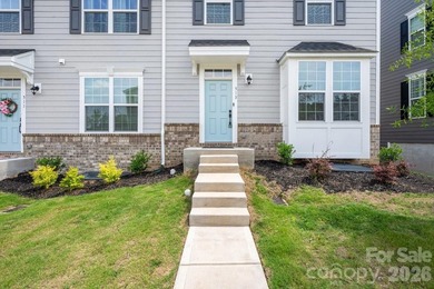Welcome to this beautifully appointed corner unit townhome in - photo 1