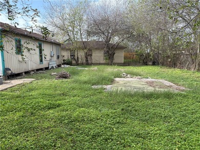 Sitting on two generous lots totaling over 8,000 sq. ft., this