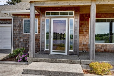 Enjoy peaceful lake and wildlife views from the covered front - photo 5