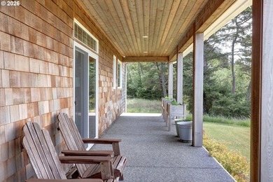 Enjoy peaceful lake and wildlife views from the covered front - photo 6