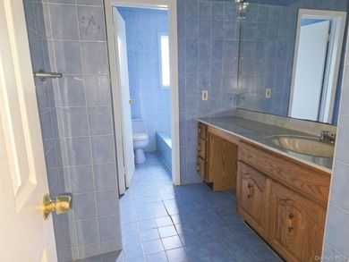 Spacious Hi-Ranch offering 4 bedrooms, 3 full baths, a bright - photo 17