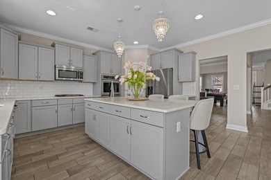NEWLY REDUCED! Welcome to 5658 Camilla Ct, a stunning 6 bedroom - photo 26