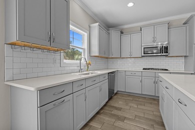 NEWLY REDUCED! Welcome to 5658 Camilla Ct, a stunning 6 bedroom - photo 27