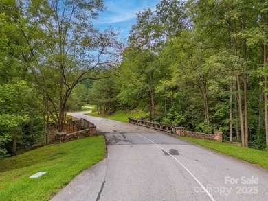 Private .97 acre lot with a stream in the highly desirable gated - photo 3