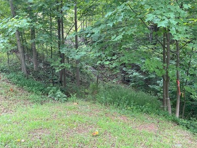 Private .97 acre lot with a stream in the highly desirable gated - photo 7