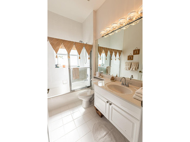Located in the gated 55+ active community of Kings Isle, this - photo 13