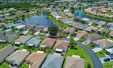 Located in the gated 55+ active community of Kings Isle, this - photo 22