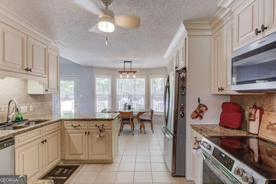 Welcome home to this beautifully maintained 3-bedroom, 2-bath - photo 11